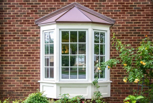 Bay window with copper roof on a brick home Knoxville